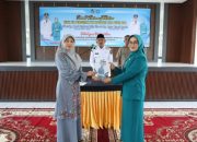 Serah Terima TP-PKK Kabupaten Limapuluh Kota, dari Ny. Nevi Safaruddin kepada Ny. Asra Yanti Safni 