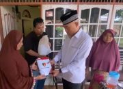 Peduli Kemanusiaan, Kombes Pol Andry Kurniawan Serahkan Bantuan Pendidikan kepada Warga di Kota Padang