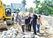 Keresahan Warga Parak Buruk Terlipur Sudah, Pembangunan Oprit dan Batu Beronjong Dimulai