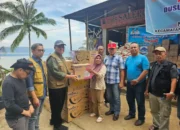 Tinjau Lokasi Bencana, Sekdaprov Sumbar Serahkan Bantuan untuk Warga Malalo