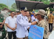 Bupati Hendrajoni Serahkan Bantuan DTH Bagi Korban Banjir dan Tanah Longsor di IV Nagari Bayang Utara