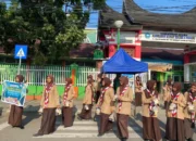 Pramuka MAN 2 Padang Bagikan 155 Paket Takjil ke Warga Sekitar