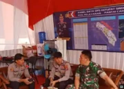 Kolaborasi Anggota Koramil 03/IV Jurai Ciptakan Kamtibmas di Lokasi Wisata Pantai Carocok